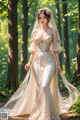 A woman in a wedding dress standing in the woods.